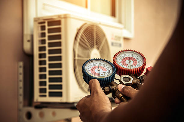 Professional Hvac technician working in Southport, NC
